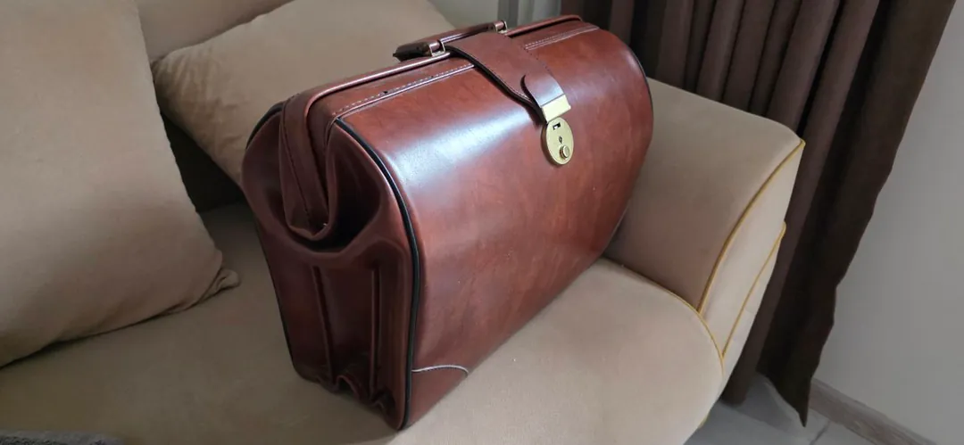 Vintage leather travel bag — photo 2