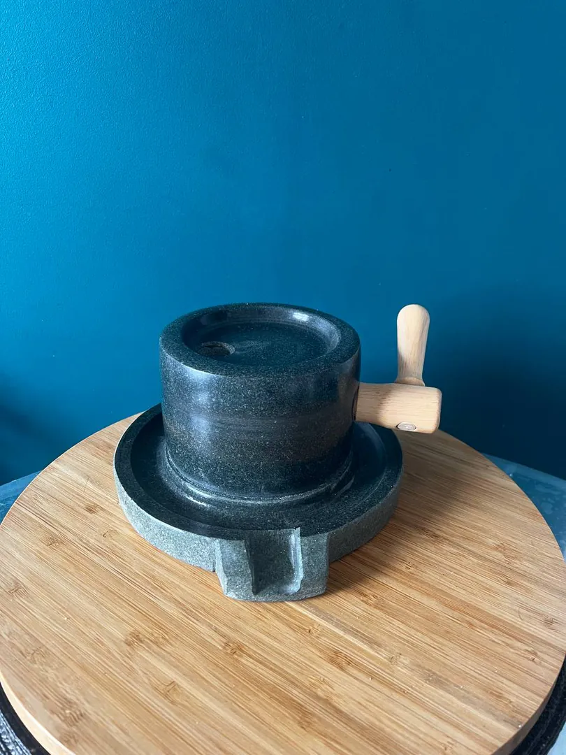 Mill made of natural green stone — photo 1
