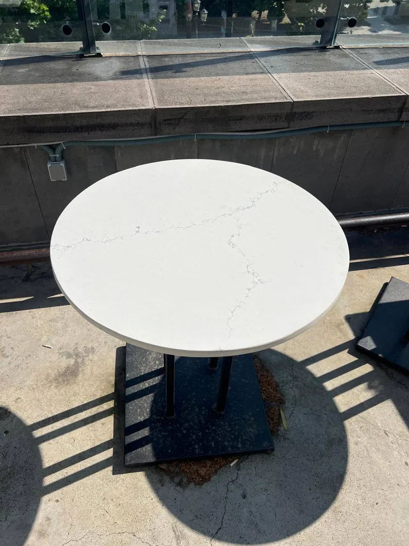 Round stone tables — photo 1