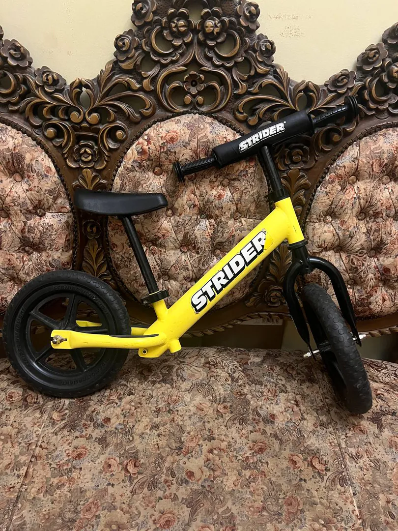 Strider balance bike — photo 1