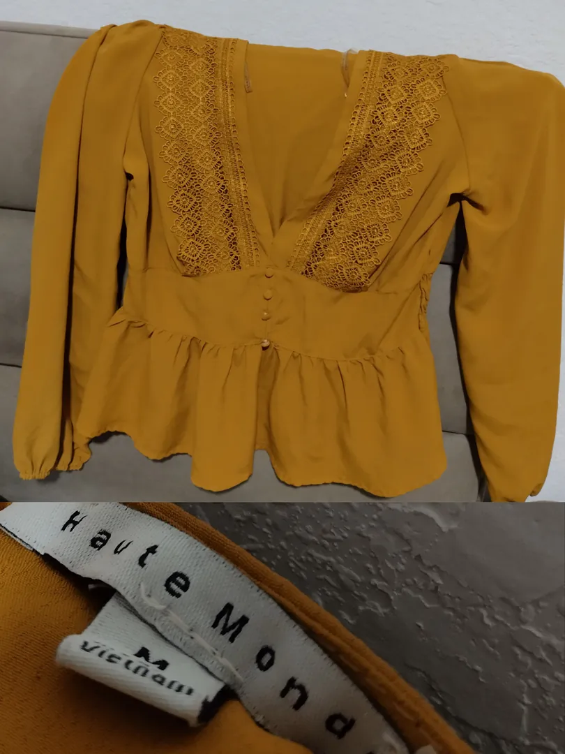 Elegant blouse with a deep neckline — photo 1