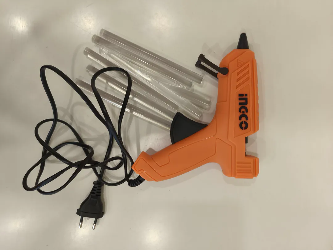 Glue gun with glue sticks — photo 1