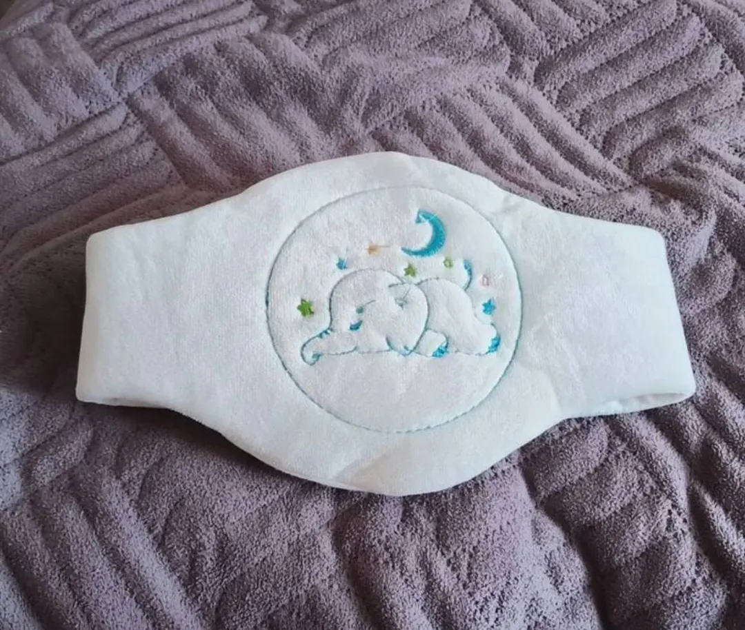 Heating belt with cherry pits for colic — photo 1