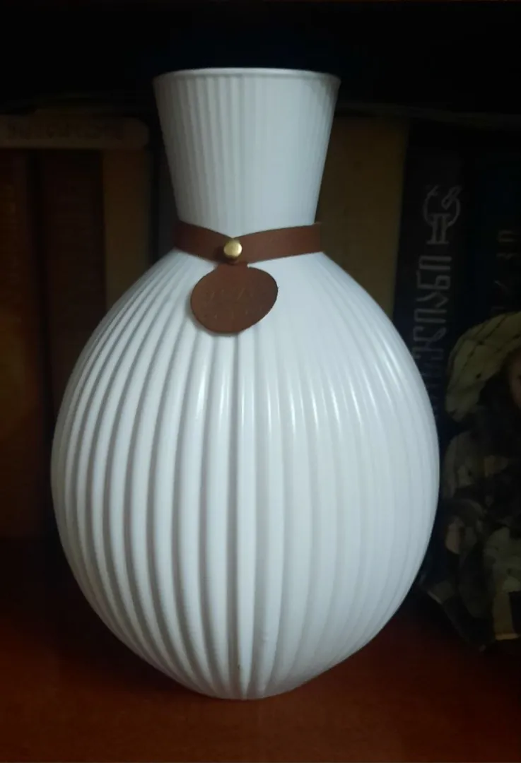 White vase with decor — photo 1