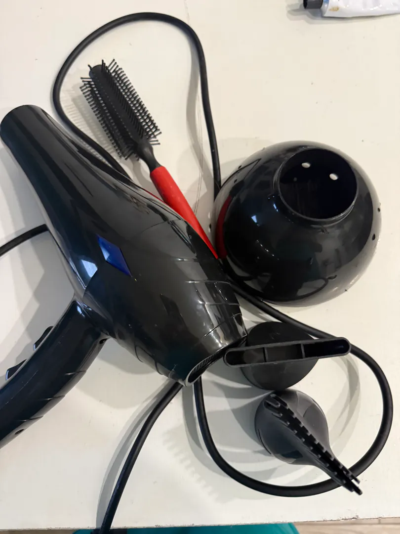 Hair dryer with nozzles and brush — photo 1